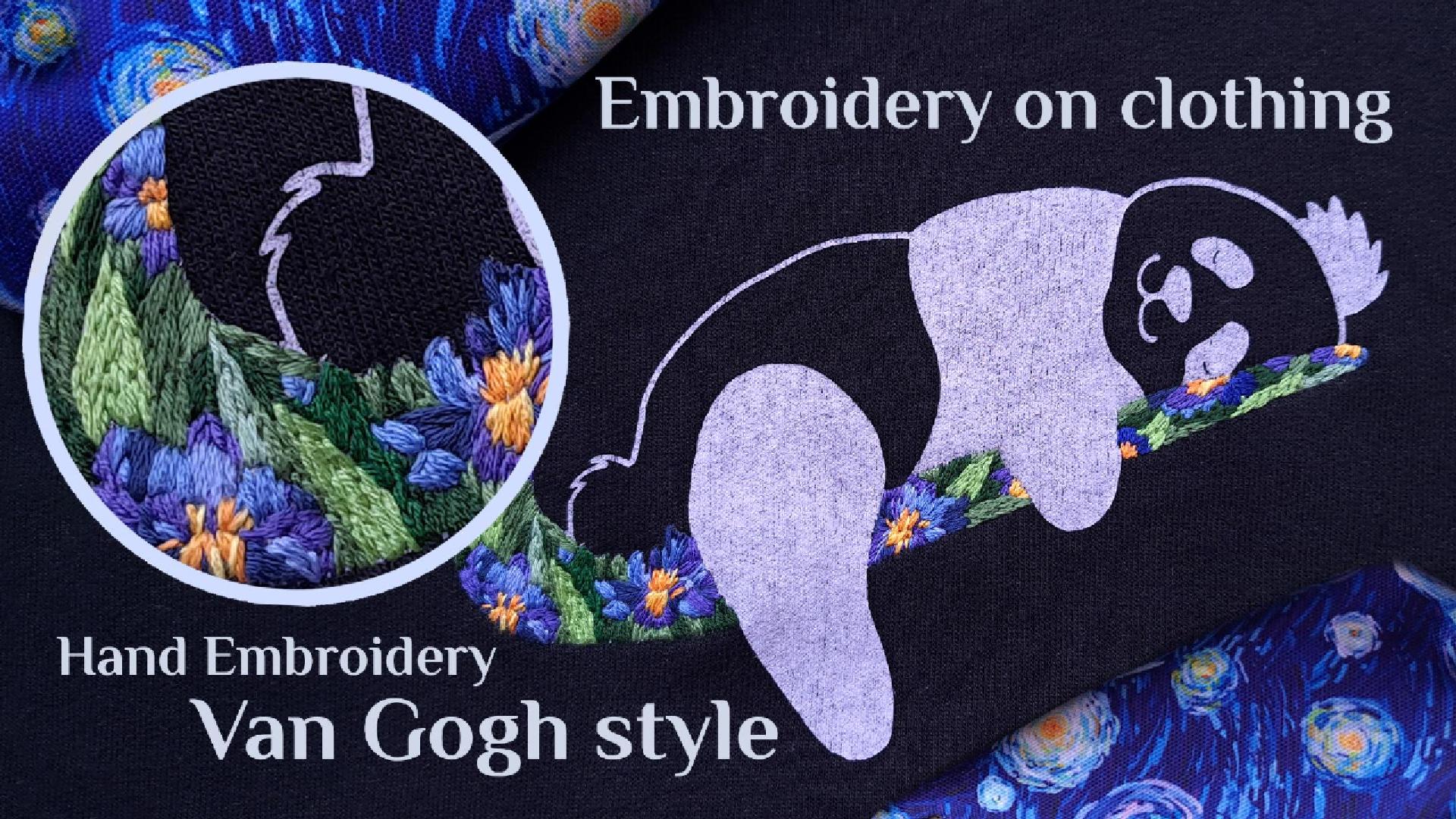 Close-up of thrifted sweatshirt featuring embroidered irises in Van Gogh style over a funny panda print, with deep blue petals, green leaves and lilac accents on cozy gray fabric 